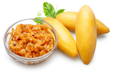 Curuba or banana passion fruits and glass bowl with curuba juicy pulp and black seeds on white background. File contains clipping path.