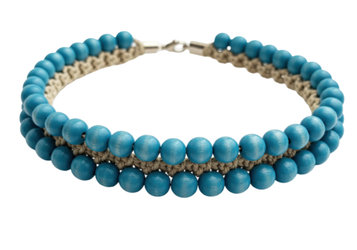 Isolated beaded necklace on display, three strands of round blue beads, boho jewelry item