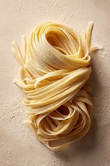 Fresh homemade tagliatelle pasta nests with flour