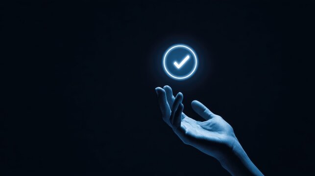 Hand holding a glowing check mark, representing approval and success