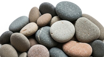 Pile of smooth, rounded stones in various earthy tones on a white background