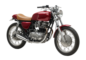 Isolated Cafe Racer style motorcycle in a studio setting with an air-cooled engine and tan seat