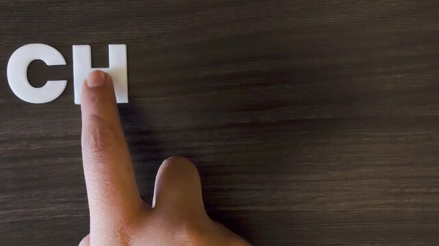 the word chicken pox written on a dark background with white block letters or capital letters