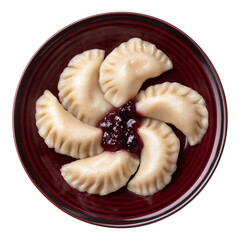 cherry dumplings arranged in deep burgundy plate emphasizing soft sweet texture in traditional dessert style