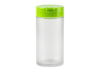 Isolated clear empty spice jar with green lid, clean storage container, food packaging object