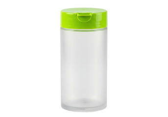 Isolated clear empty spice jar with green lid, clean storage container, food packaging object