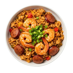 Fototapeta premium Delicious jambalaya with shrimp sausage and green onions in a white bowl top view transparent background