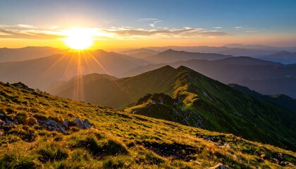 Mountain peak landscape with golden sunlight, hazy layers, and grass