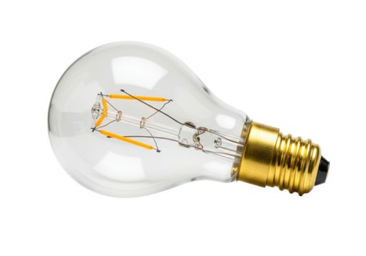 Isolated warm clear Edison light bulb emitting energy with metal base and filament wire