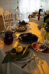 Elegant Dining Table Setup with Plates and Glassware