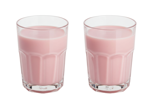 Isolated glasses of pink strawberry flavored milk ready to drink a healthy beverage
