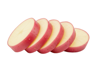 Isolated red potato slices in a row ready to be cooked for a healthy food dish