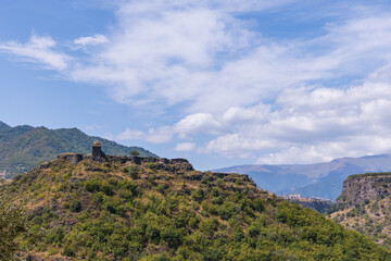 Scenic view with Kayan Fortress placed on top of a mountain, Armenia