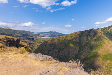 A vast valley and rolling hills under a bright blue sky. Armenia, Caucasus