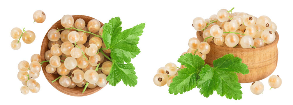 white or yellow currant in wooden bowl isolated on white background. Top view. Flat lay