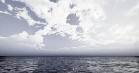 Waves gently ripple across the calm ocean surface as clouds drift overhead at twilight. The tranquil scene evokes a sense of peace and solitude by the water.