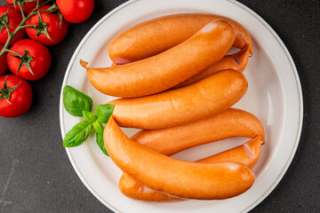 Sausage meat pork or chicken meat fast food natural tasty appetizer fresh delicious gourmet food background on the table rustic top view copy space