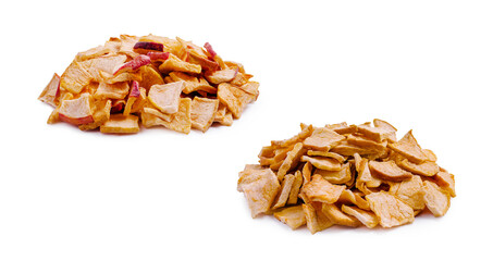 Dried apple slices arranged in two separate piles on a white background