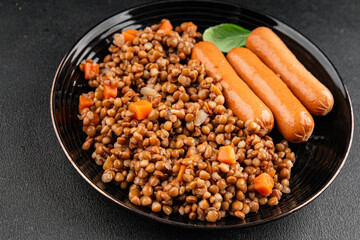 Lentils with sausage second course quick meal natural tasty appetizer fresh delicious gourmet food background on the table rustic top view copy space