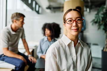 Group of young business people having a meeting or presentation and seminar in the office. Portrait of a young businesswoman