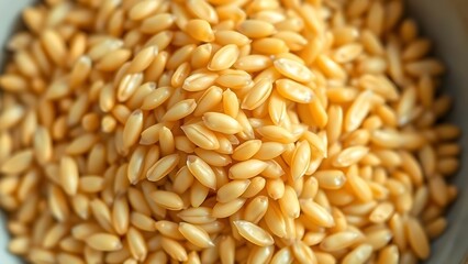 kamut. Close-up of a bowl containing cooked grains, highlighting their elongated shape. menu design, packaging mockups, designed for culinary blogs and recipe cards for restaurants.