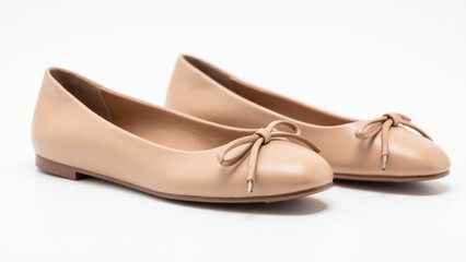 Fototapeta premium Stylish ballet flats in beige color with bow detail, perfect for casual or formal occasions. Comfortable and versatile footwear choice