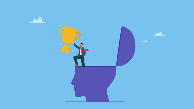 Success businessman holding winning trophy standing in his mindset head. Success mindset, positive attitude to succeed, motivation or optimistic for self development, believe or confidence.