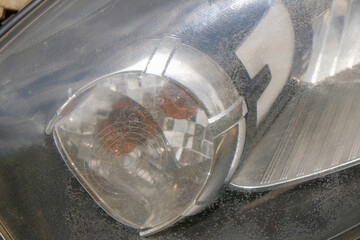 Close up of dull car headlamp. For graphic design, 3D rendering and banners © Hary