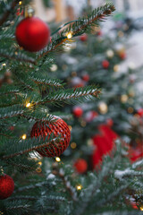 Festive pine tree decoration captured with a cozy, bokeh-filled Christmas background