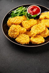 Chicken nuggets fast food natural tasty appetizer fresh delicious gourmet food background on the table rustic top view copy space