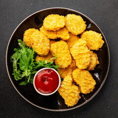 Chicken nuggets fast food natural tasty appetizer fresh delicious gourmet food background on the table rustic top view copy space