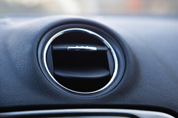 Close-up view of a car air vent highlighting modern vehicle design and dashboard features