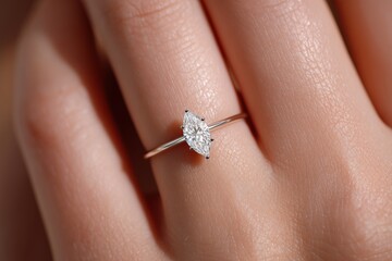Delicate Marquise Diamond Ring on a Woman's Finger