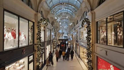 Lots of people shopping at the mall for Christmas. - Powered by Adobe