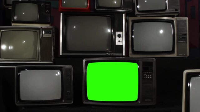 Vintage TVs Stacked, One Turns On With Green Screen, Rapid Zoom to Green Screen - Authentic Footage, Not AI-Generated 