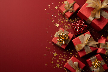 Elegant Red Gift Boxes with Gold Ribbons and Star Confetti Frame - Holiday Celebration Flat Lay