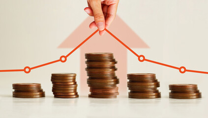 Financial Growth and Decline Concept. Investment Performance Chart Over Coin Stacks Showing Rise and Fall. Market Volatility and Economic Trend
