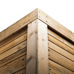 Close up of weathered wooden crate corner with visible grain and texture isolated on black background with balanced lighting and sharp focus