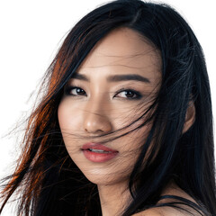 Close up Portrait of a Young Asian Woman With Dark Hair Covered in Glitter Sparkles With Soft Lighting and A Black Background