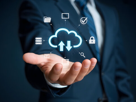 Businessman holding a cloud computing icon representing data storage and network connection for business technology solutions