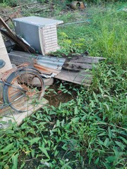 Vintage wooden cart and fishing boats on the river and beach