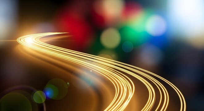 Night traffic light trails on a fast city street