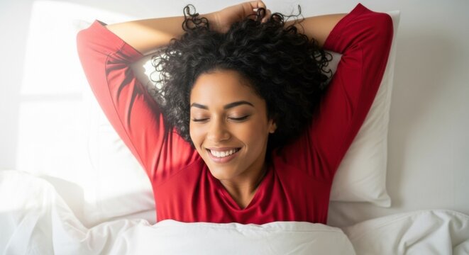 Young woman waking up with a relaxed smile in bright morning light, symbolizing rest, wellbeing, comfort, and a positive start to the day. Ideal for sleep products, wellness ads, lifestyle blogs, and 