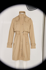 Classic tan trench coat with belted waist © mdishakrahman