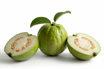Whole and halved green guavas with leaves on white background fruit