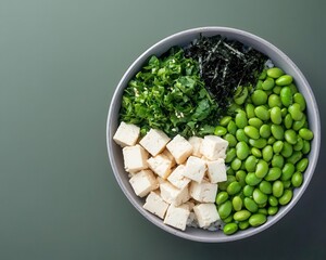 Vegan poke bowl with edamame, seaweed, and tofu cubes, plantbased eating, Hawaiianinspired dish