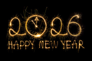 Happy New Year 2026. Burning sparkling text 2026 isolated on black background.
