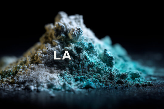Rare-earth element lanthanum in fine powdered form with vibrant hues