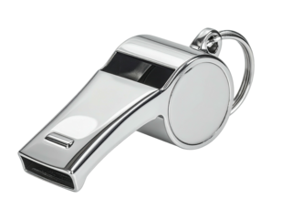 A gleaming metallic whistle with a prominent loop, isolated on a stark black background