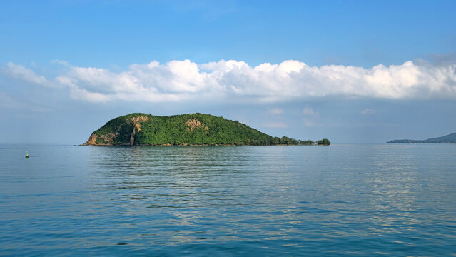 Tropical island Ko Tae Nai surrounded by calm blue ocean near Island Ko Pha-Ngan, Surat Thani, Thailand.